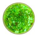 Green iridescent glitter in a clear container on a white background