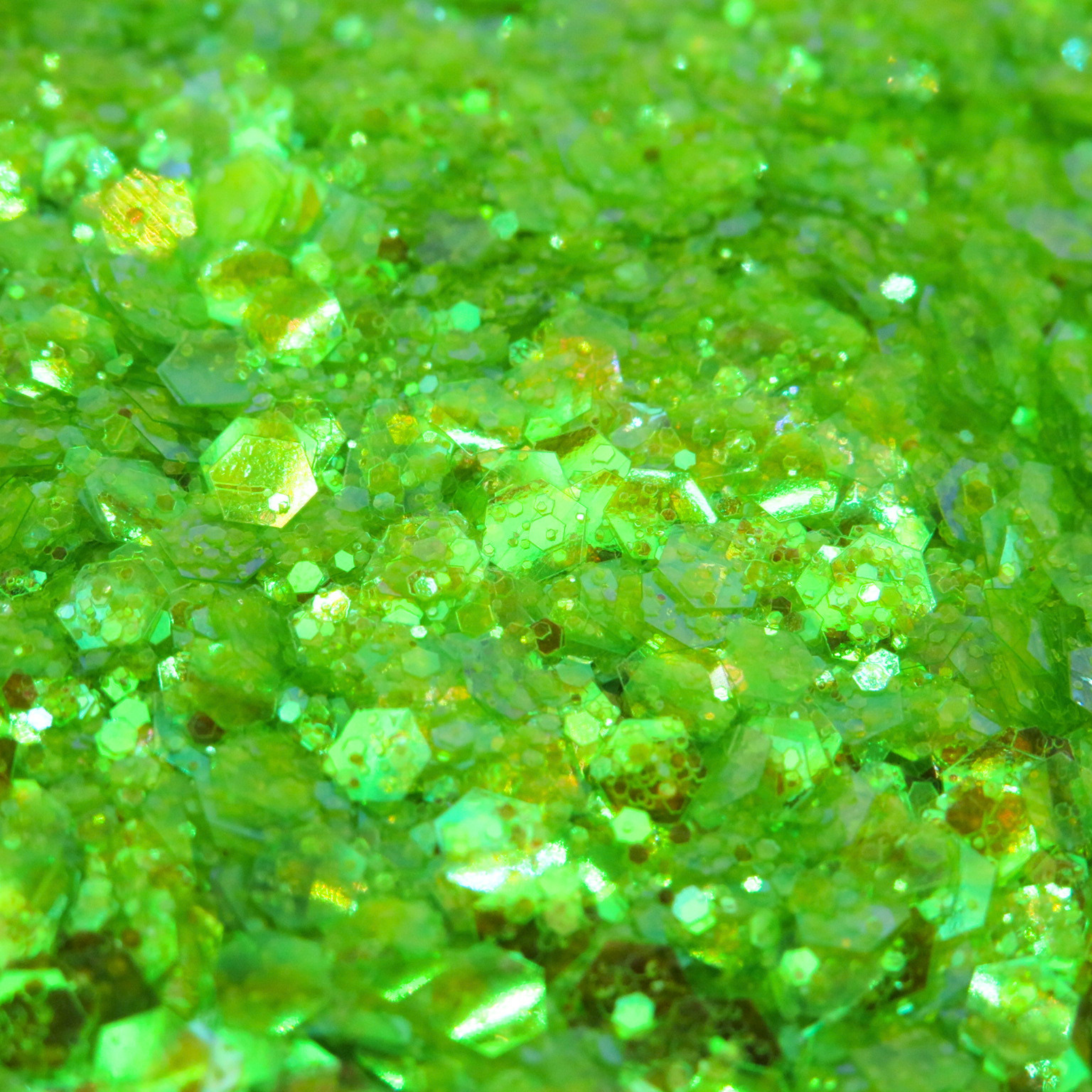 A close of up of green iridescent glitter