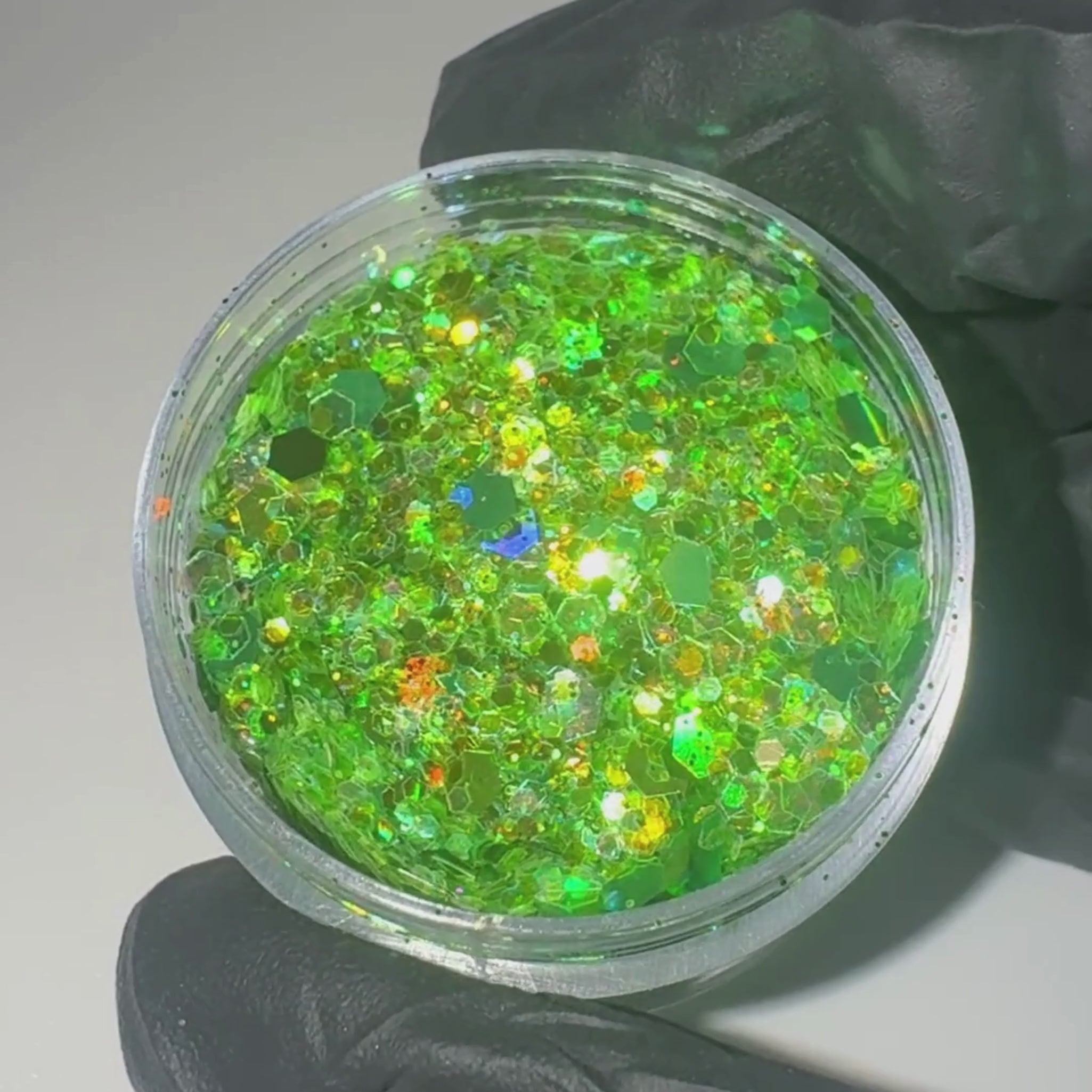 Peachipie Beauty iridescent green festival glitter product video showing shimmer and sparkle close-up texture