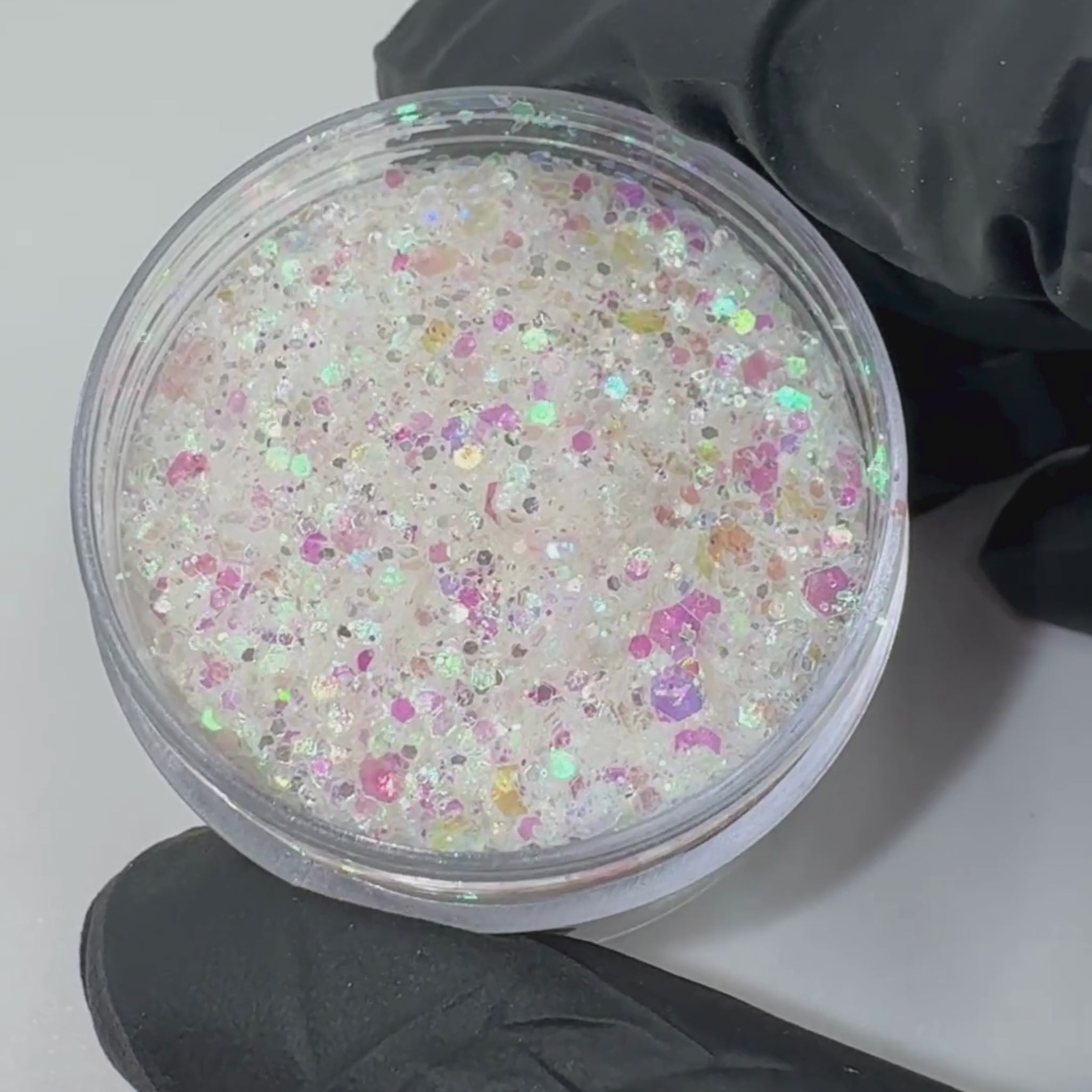 Peachipie Beauty clear iridescent festival glitter video with pink and yellow tones